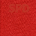 Traditionswahrend und identitätsstiftend: Auch die aktuelle Version des Parteibuchs ist rot (2005).